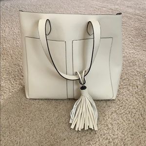 Cream colored purse and makeup bag set